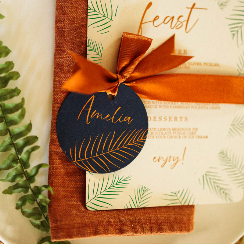 copper and blue fern leaf name tag for wedding place setting