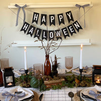 black and white happy halloween garland