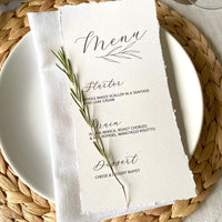 neutral wedding menu torn edges