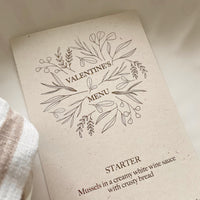 cream and gold valentines day slim menu card with leaf design