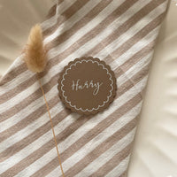 brown and white scallop edge name tags for wedding