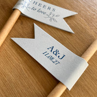 cheers to love brown paper straws with light blue card and blue foil personalised with couples initials and date for wedding day, engagement party or anniversary celebration