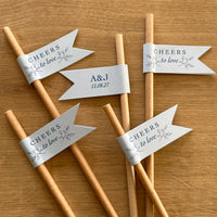 cheers to love brown paper straws with light blue card and blue foil personalised with couples initials and date for wedding day, engagement party or anniversary celebration
