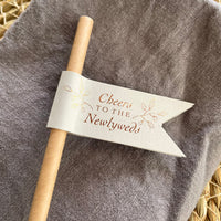 cheers to the newlyweds wedding decor brown paper straw with light grey card and gold foil for drinks on arrival or drinks station.