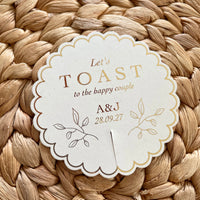let toast to the happy couple cream and gold drink tag scallop circle