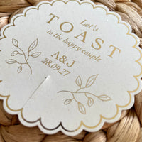 let toast to the happy couple cream and gold drink tag scallop circle