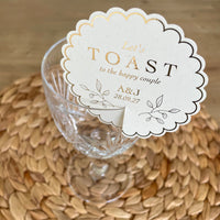 let toast to the happy couple cream and gold drink tag scallop circle