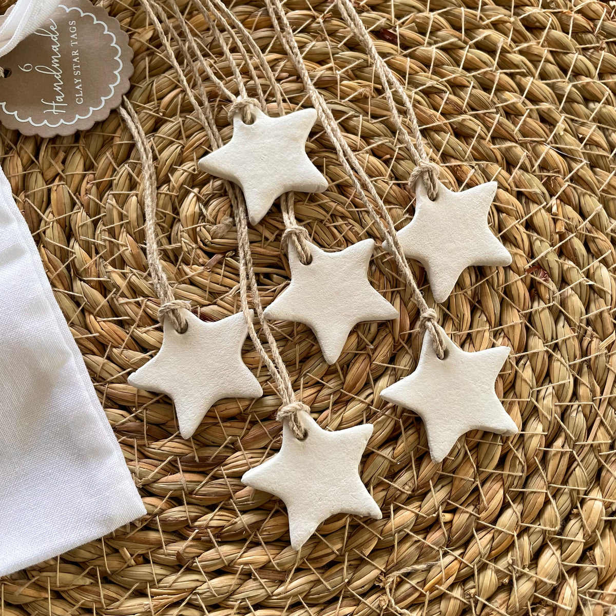 white clay star christmas napkin holders