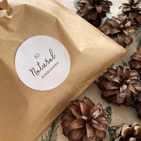 paper bag natural pinecones for table styling for autumn and christmas