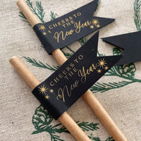 black and gold new years eve drink straws