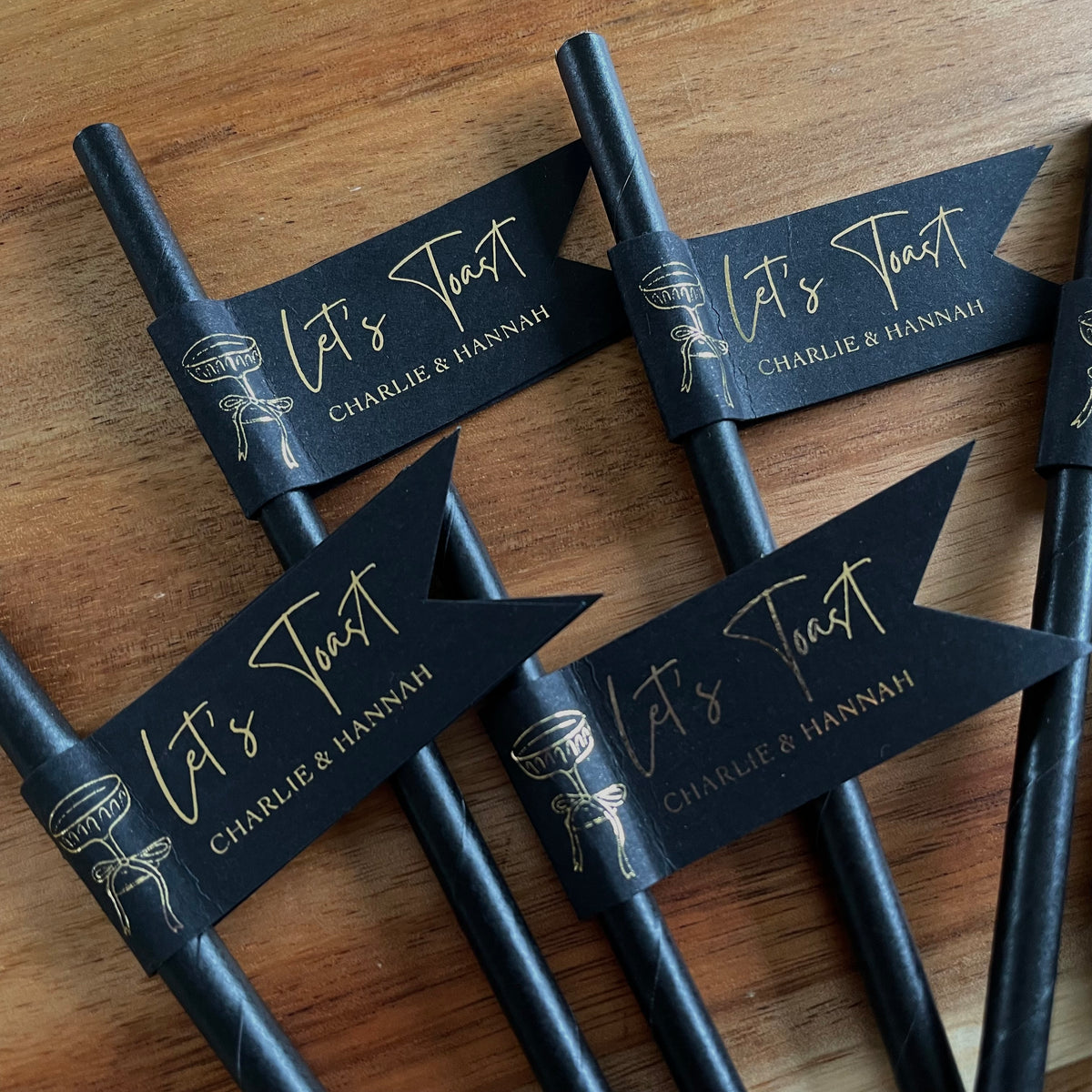 lets toast drink straws black and gold