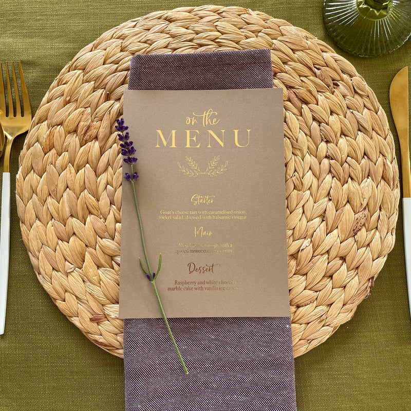 brown card and gold foil dinner menu card for place settings