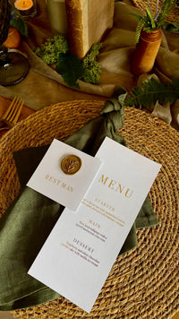 square name card laid on top of  menu card for green rustic wedding style