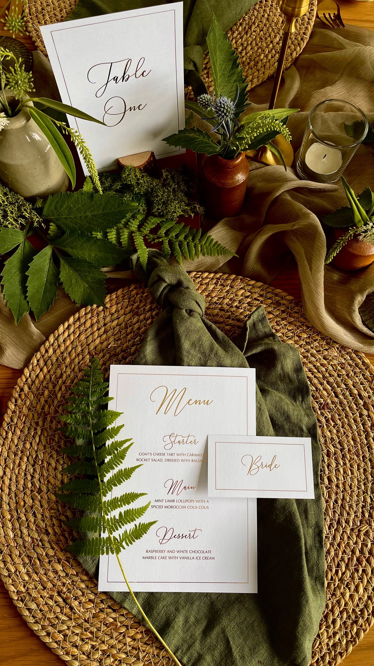 elegant white and gold wedding table stationery