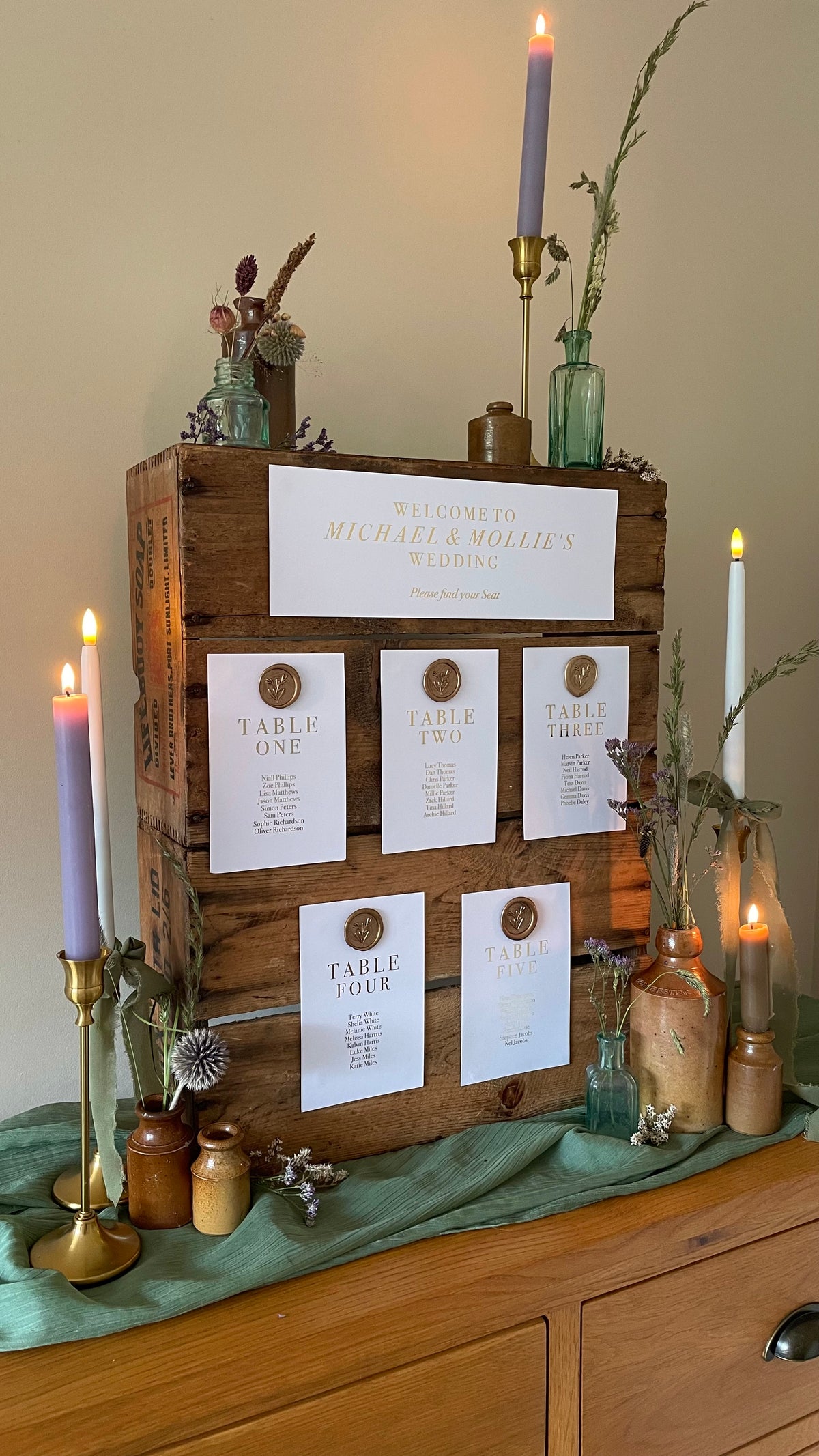 creative table plan display for a table top at rustic barn wedding venue