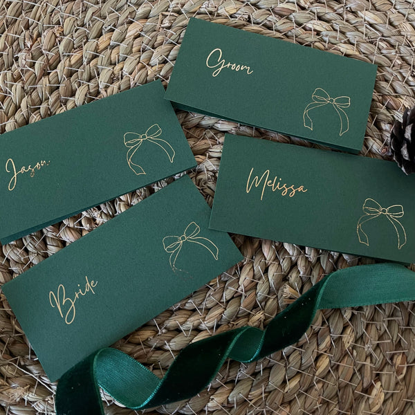 green and gold name cards for christmas dinner table