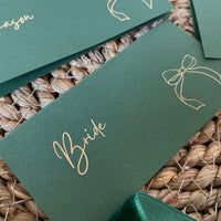 green and gold foil name cards for wedding tablescapes 