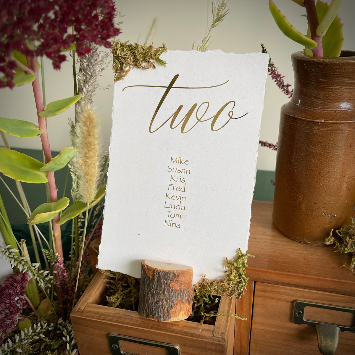 gold foil table plan cards for forest wedding