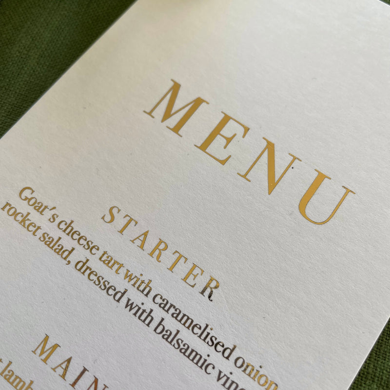 gold foil and white dinner menu for wedding or engagement party