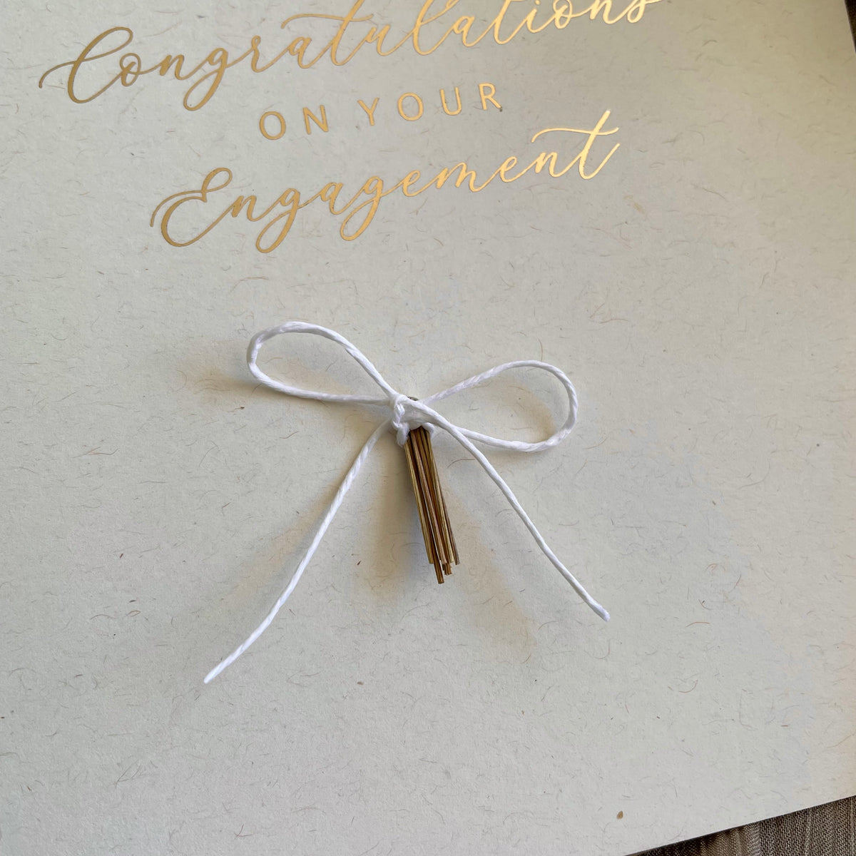 gold foil and ivory card for engaged couple