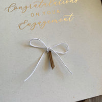 gold foil and ivory card for engaged couple
