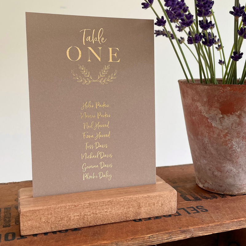 gold foil and brown card table plan cards