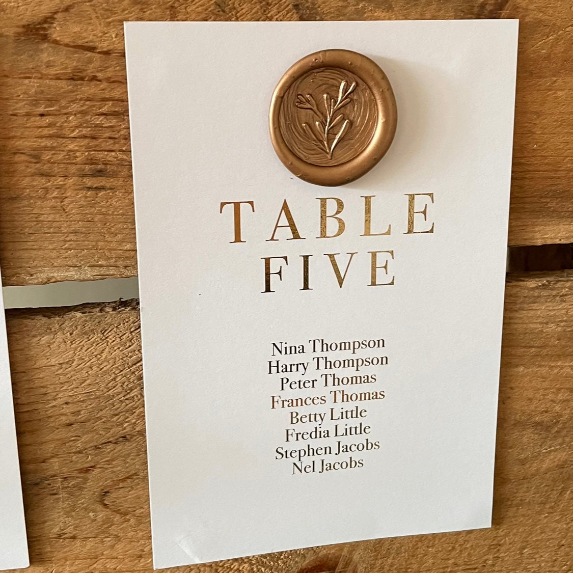 gold wax seal individual table plan cards with gold foil text