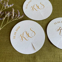 circle drink tags with foil personalised with couples initials and date for weddings, anniversaries, enegagements