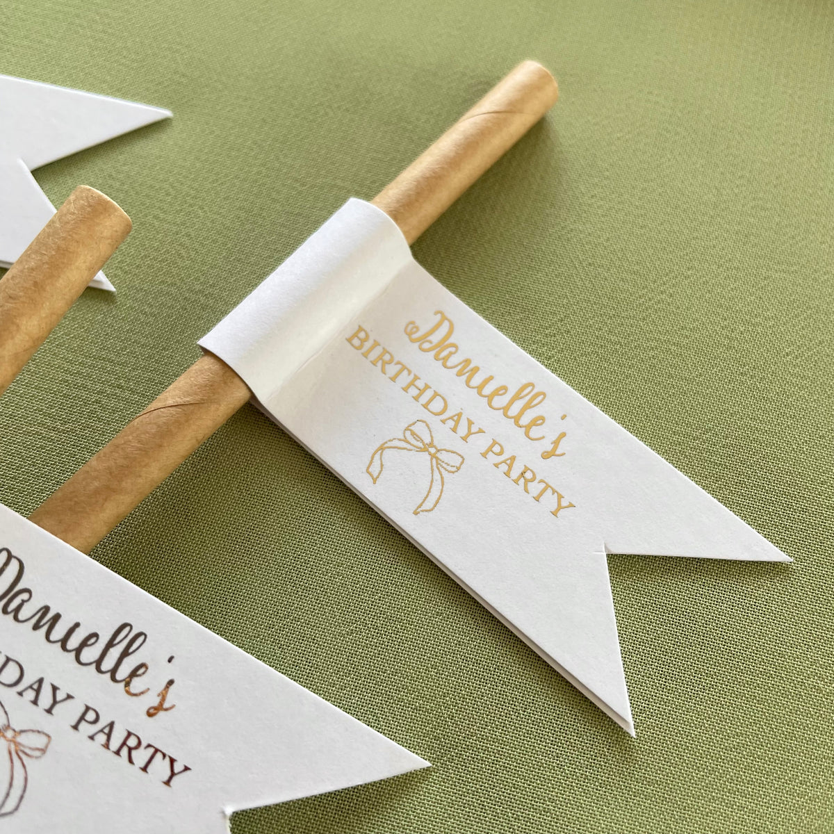 white and gold paper drinking straws for birthday party