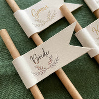 straw flags with guests names for rustic wedding table setting