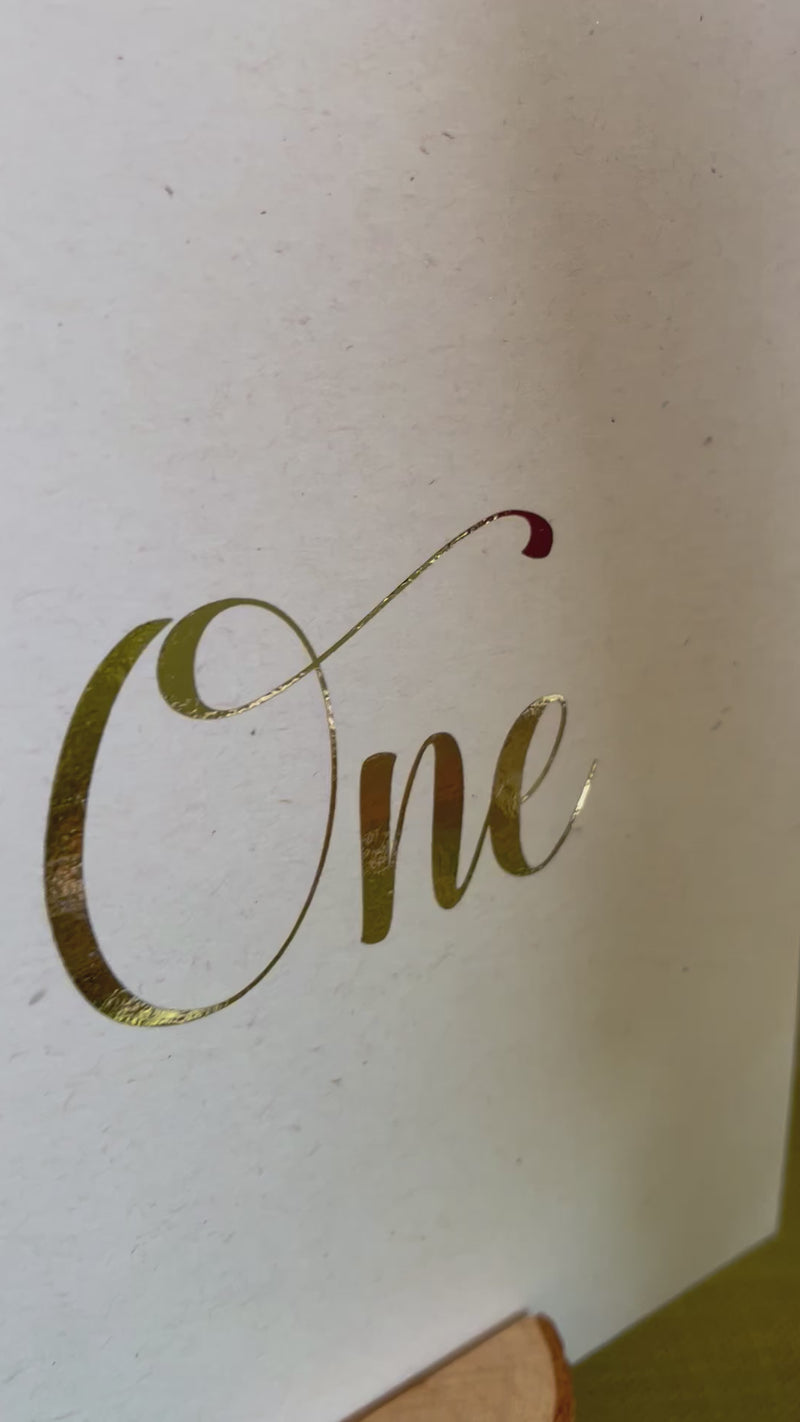 foil table numbers in gold for wedding tables