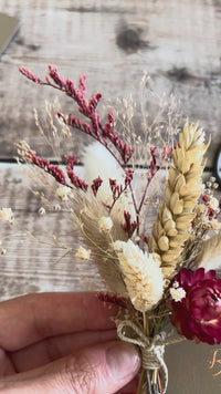 mini dried flower bouquet and luggage gift tag personalised with bridesmaid name