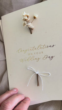 gold foil and cream wedding card for the happy couple