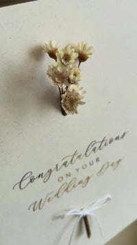 cream wedding day card with gold foil and dried flowers