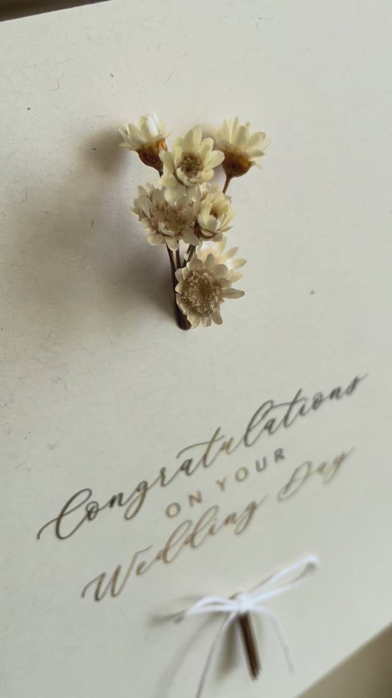 cream wedding day card with gold foil and dried flowers
