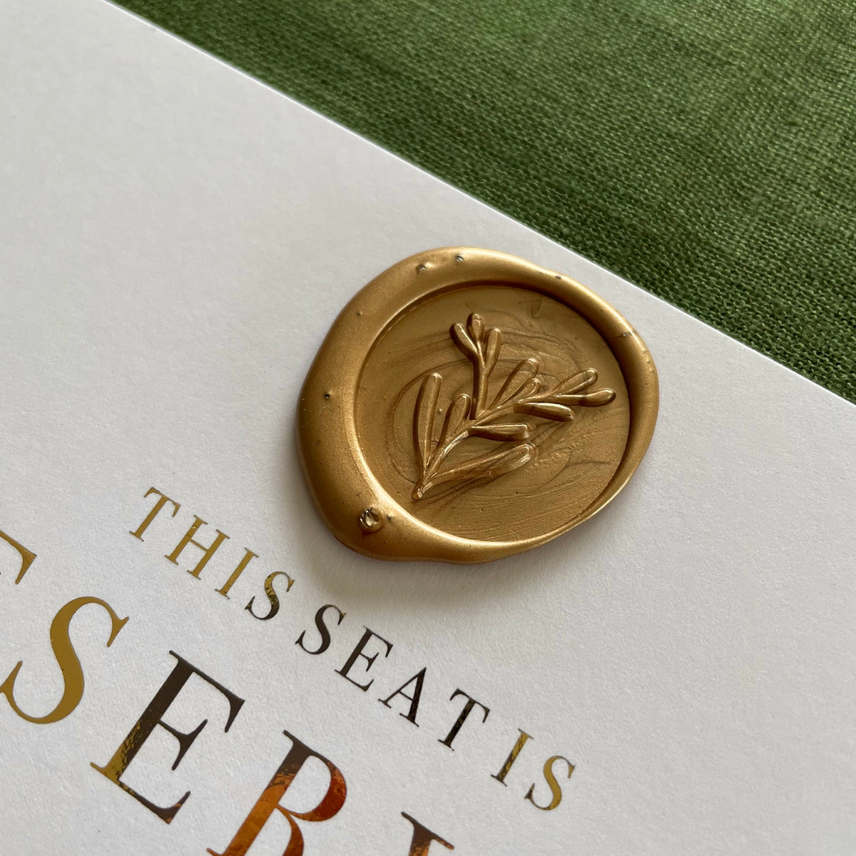 white and gold foil reserved chair signs for wedding ceremony