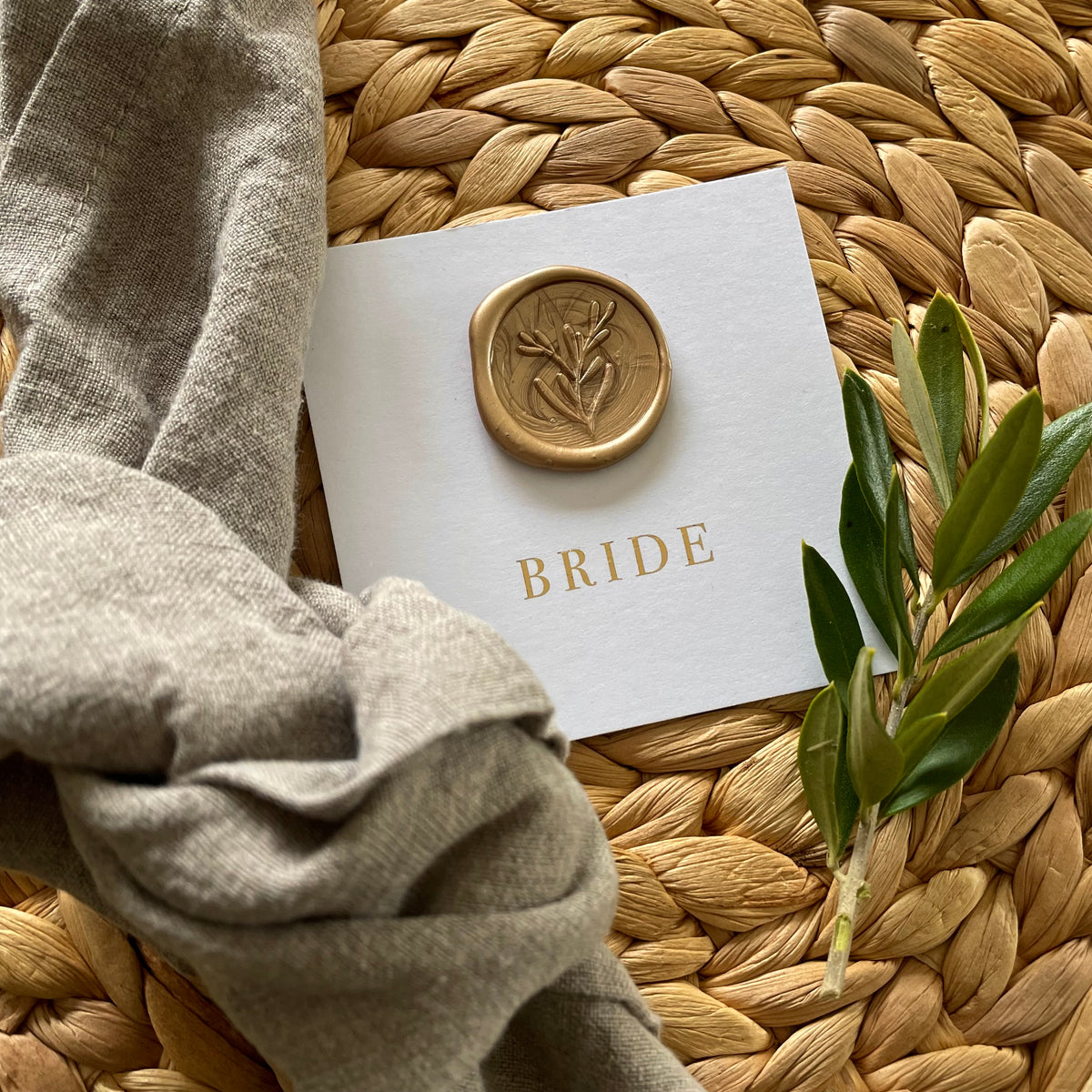 flat square place card for rustic wedding style, with gold wax seal and gold foil guests names