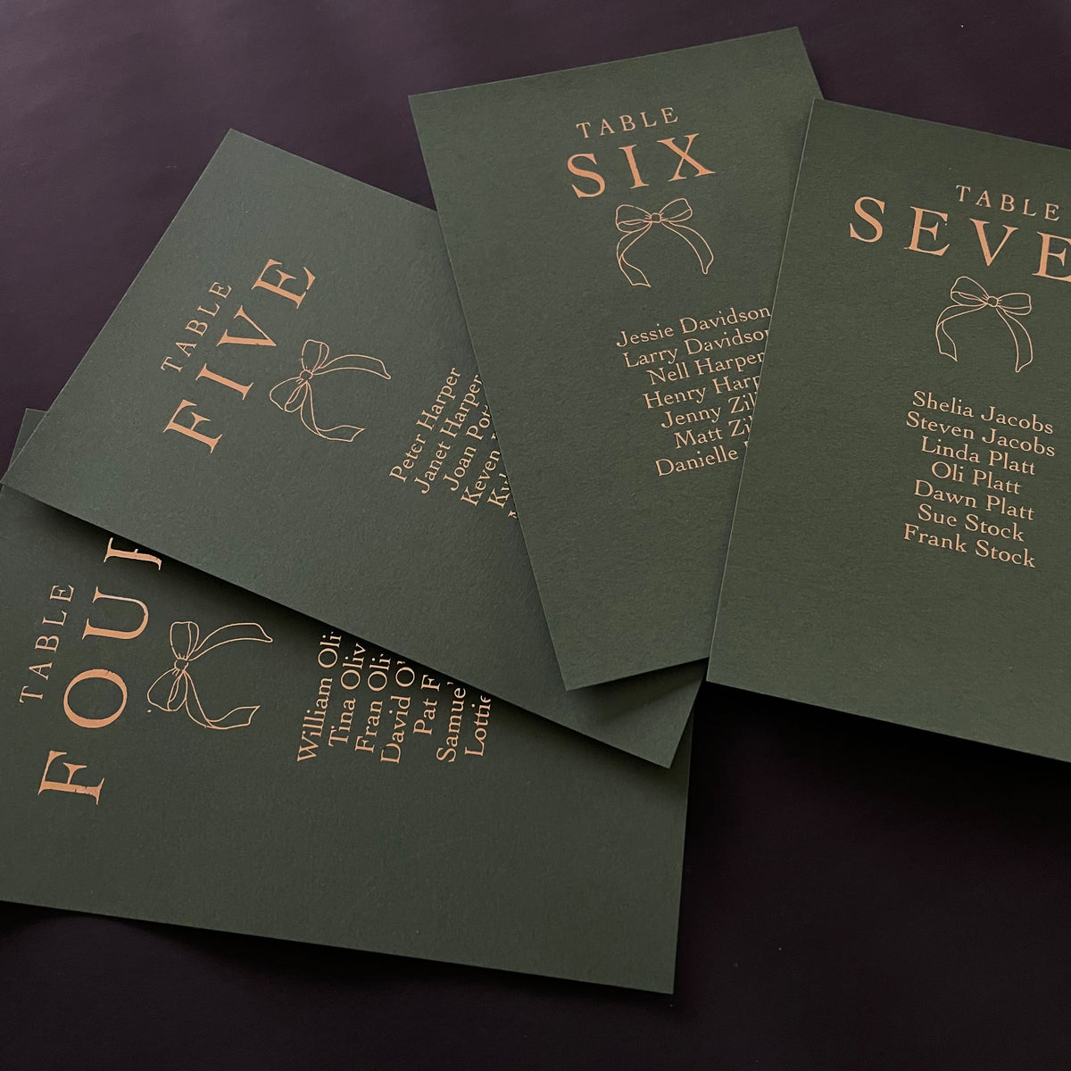 Forest green & gold foil individual bow table plan cards