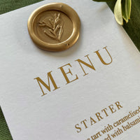 wax seal dinner menu for wedding tables. white gold foil slim card