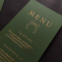 green and gold foil menu cards for wedding tables