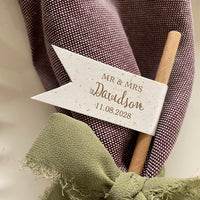 Personalised flag shape drink straws with wedding couples married name, titles and date. Cheers to the newlyweds on the front. for drinks reception or styling place settings on the tables.