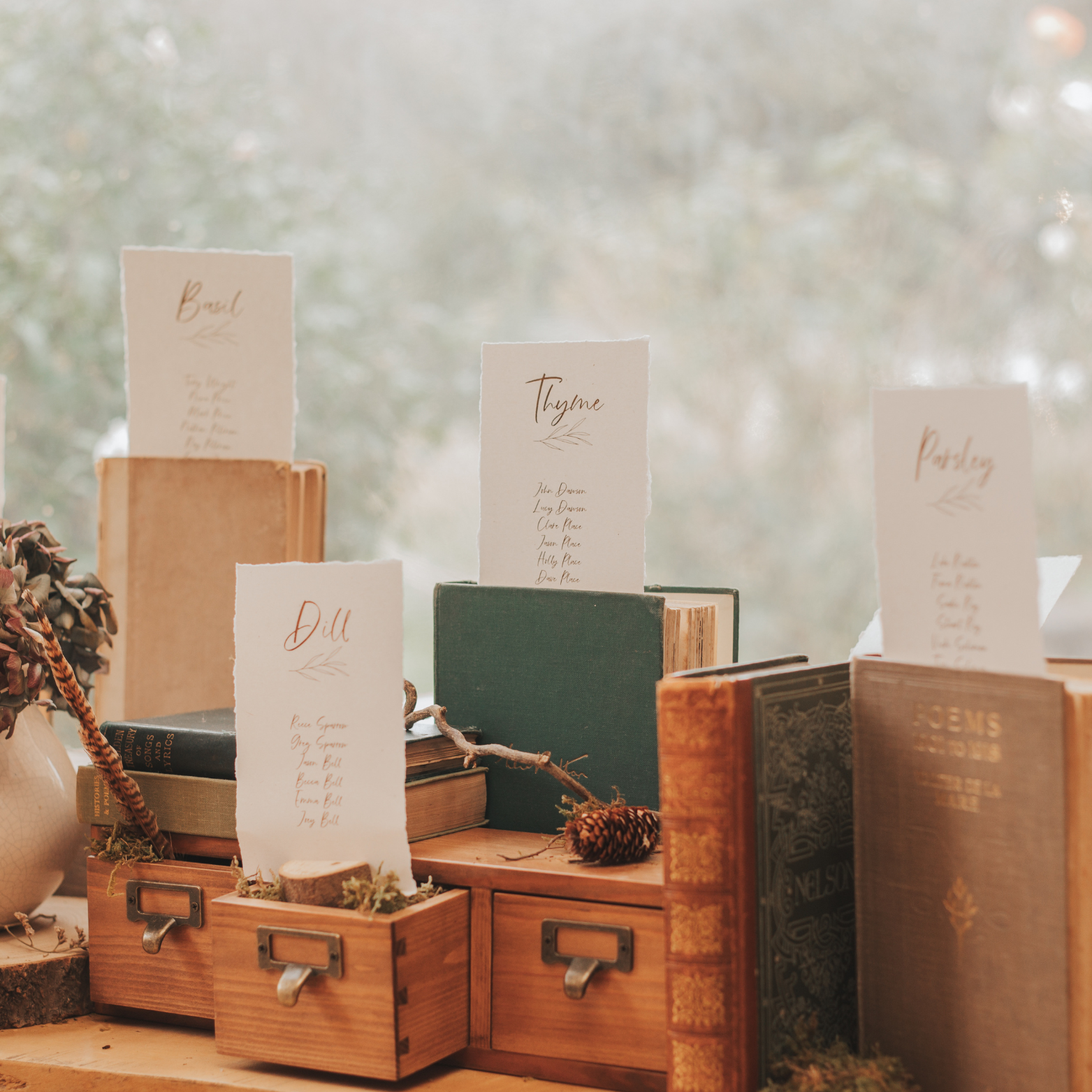 Individual table plan cards with torn edges and foliage illustration ...