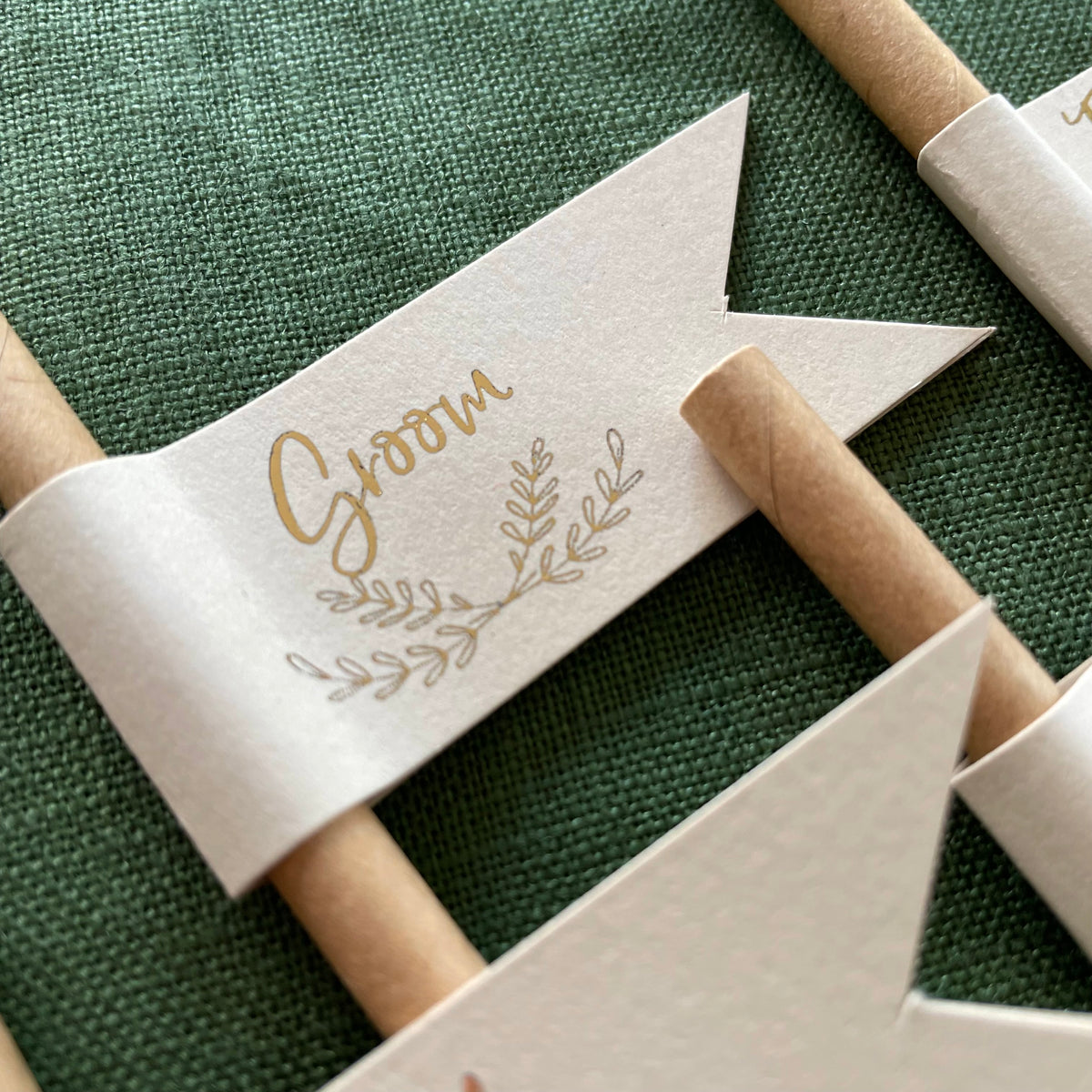 rustic wedding drink straws with guests names in gold foil for place setting