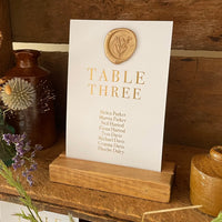individual seating chart cards for guests seating at rustic wedding reception