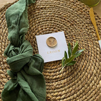 white square place setting cards with gold foil and gold wax seal for guests