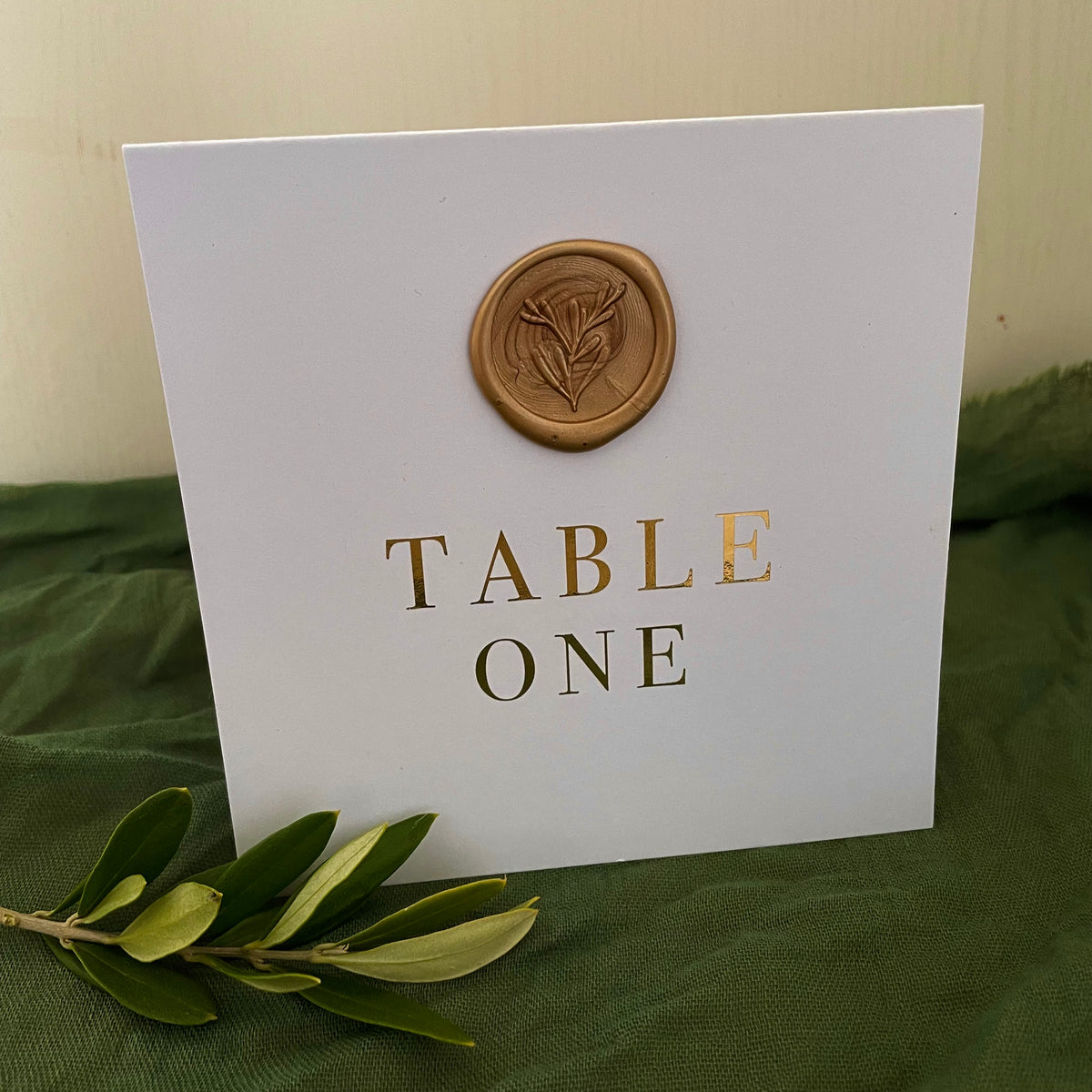 folded table numbers for wedding gold foil on white card gold wax seal