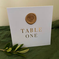 folded table numbers for wedding gold foil on white card gold wax seal