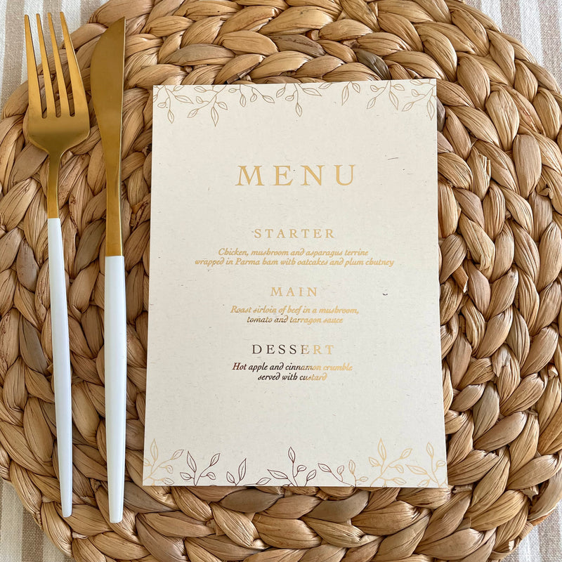 menu card for wedding with gold foil on cream card