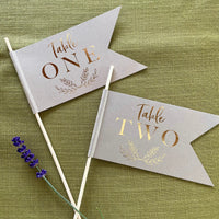brown and gold foil table number flags for wedding centrepiece