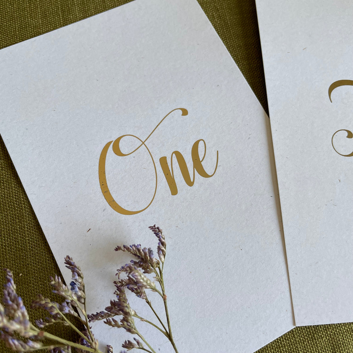 recycled card table numbers for gold wedding